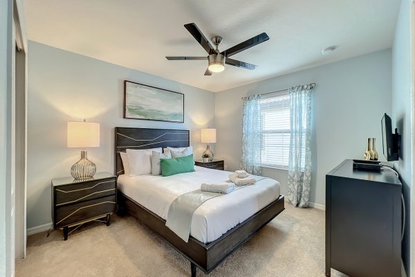 This second floor queen bedroom is connected to the Frozen-themed room via a shared bath.  Makes a lovely family suite or works well as private rooms.