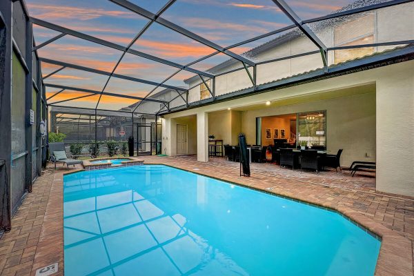 End your day with drinks on the lanai.  With ample seating for 16, plus four loungers, the entire group can enjoy the pool and spa together.