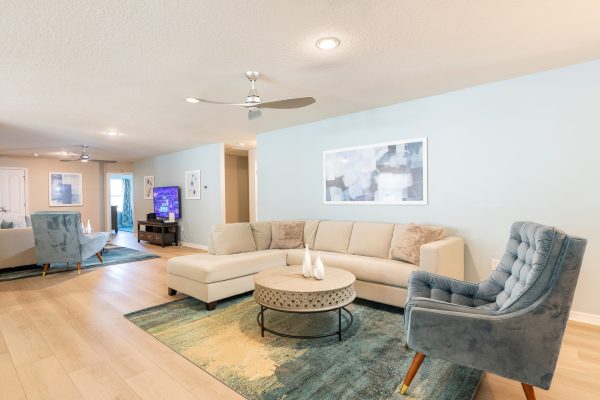 Loft level living area with large TV at Magic Moments Kissimmee vacation villa