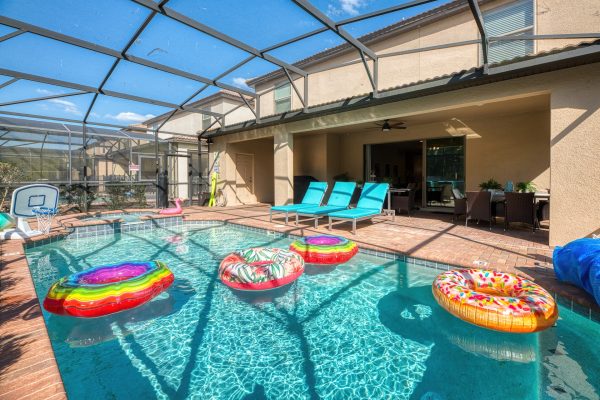 Full length private pool with screened enclosure at Magic Moments Kissimmee vacation villa